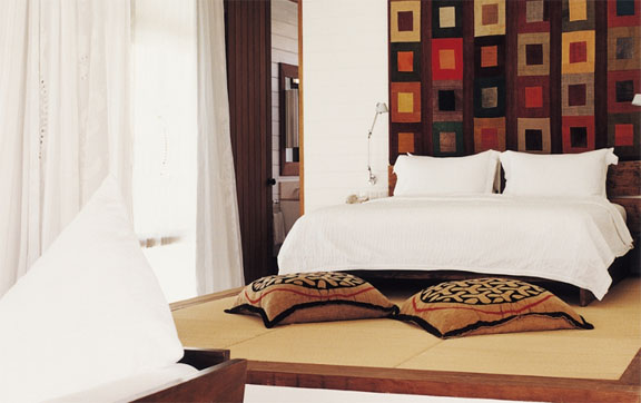 Cocoa-Island-by-COMO-Maldives-Deck-Ocean-Interior-of-Villa-Bed-Bedroom