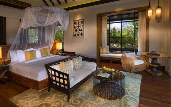 The interior view of the Beach Villa bedroom at the Jumeriah Vittaveli, Maldives.
