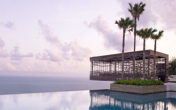 View of the infinity pool running off the cliff edge at Alila Villas Uluwatu, Bali