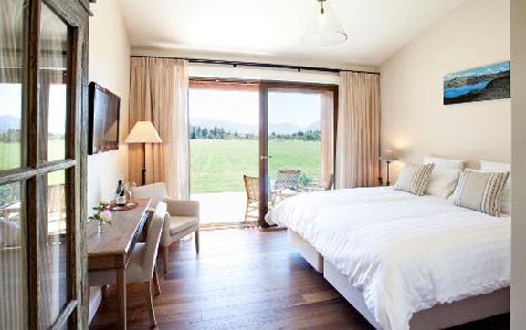 Wanaak holiday homes, luxurious bedroom and view.