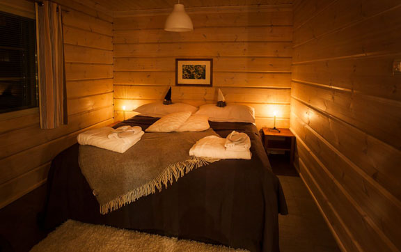 finnish-christmas-adventure-4-days-with-luxury-action-chalet-master-bedroom