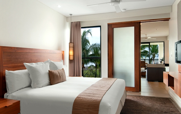 bedroom-of-a-guestroom-at-hilton-hotel-and-sp