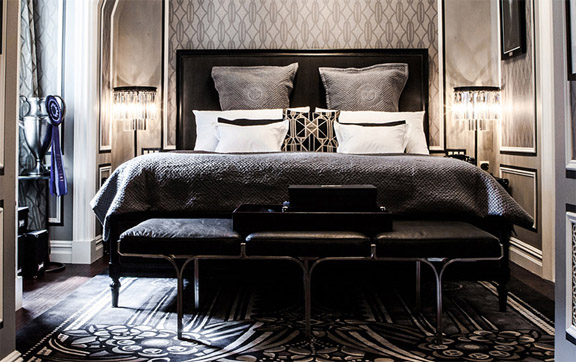 An image of the King Fitzgerald Suite bed and bedroom at The Plaza Hotel, New York, USA